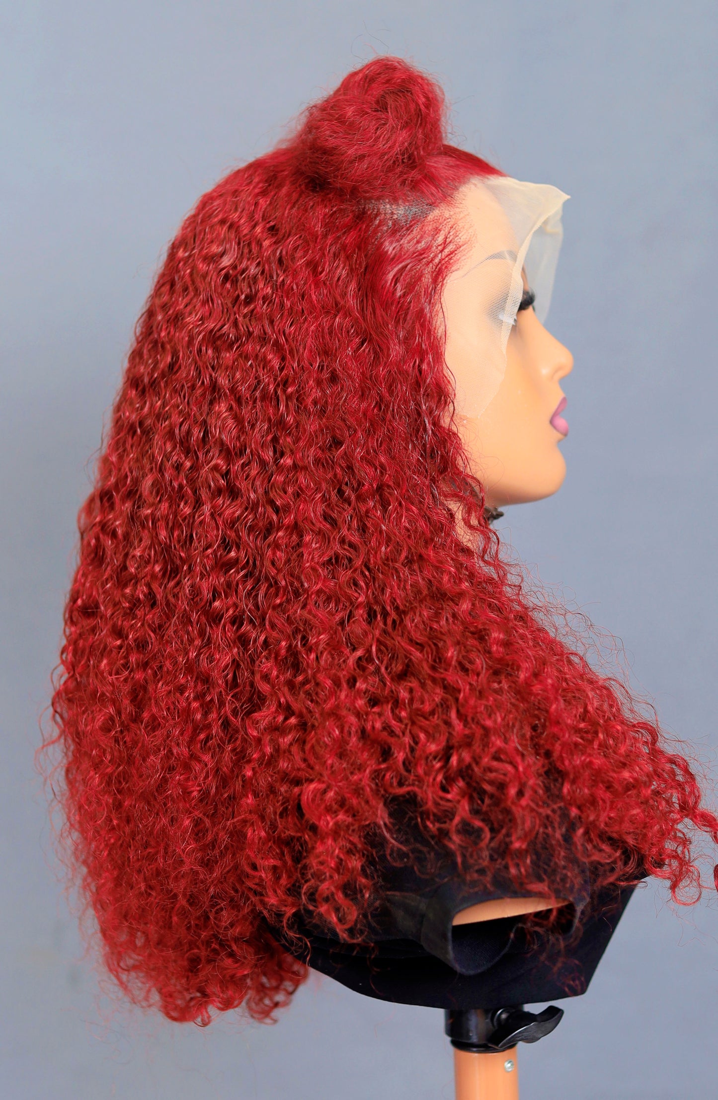 Burgundy curls.